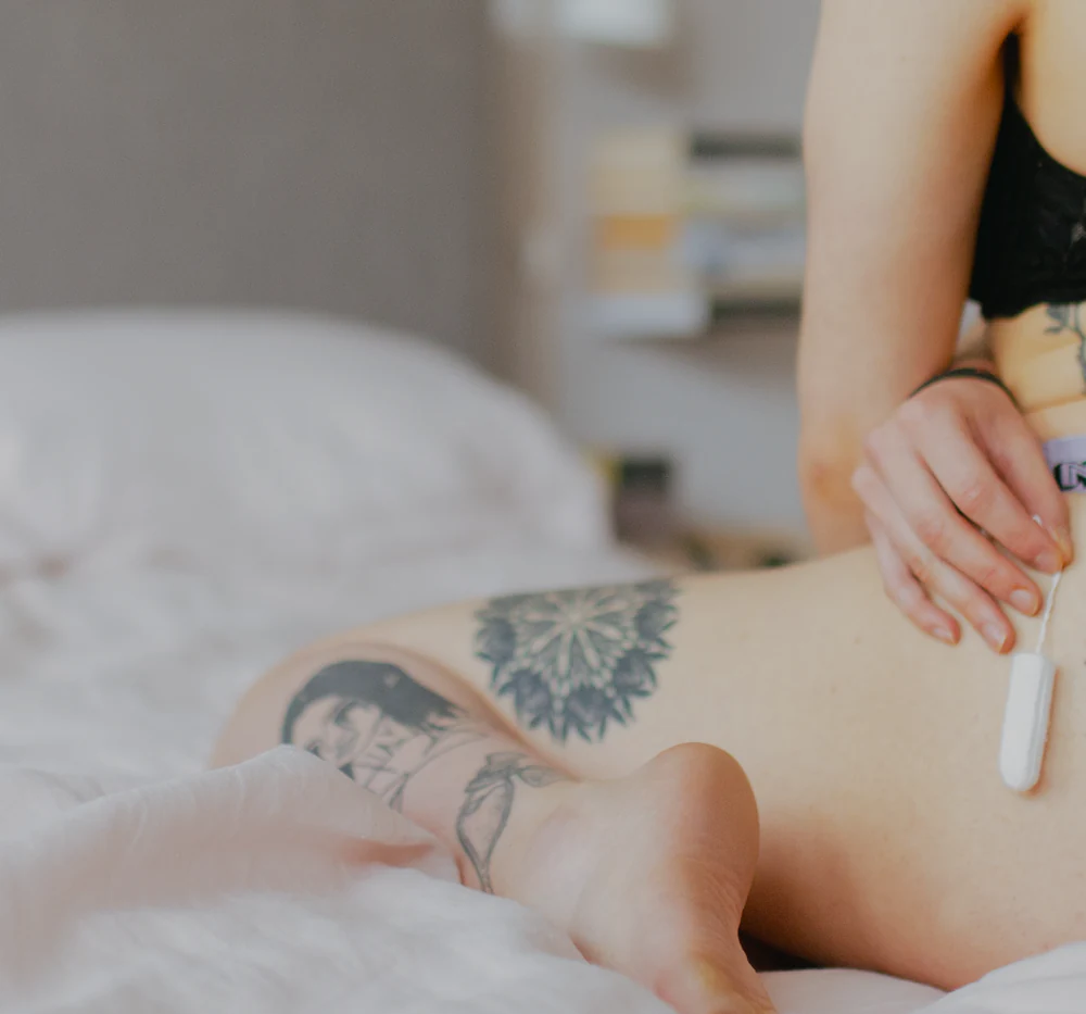 hand holding natracare organic cotton tampons