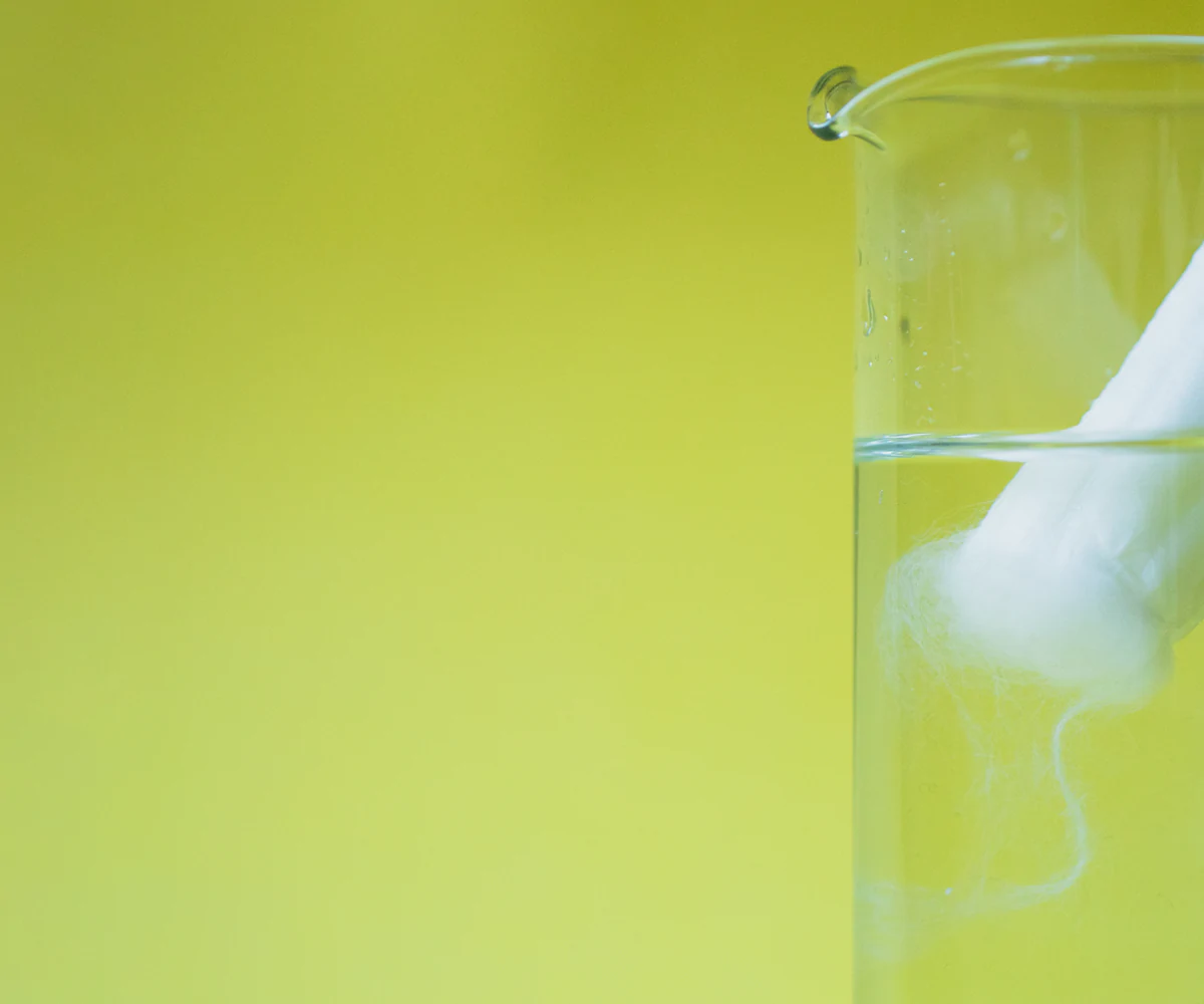 tampon in glass of water