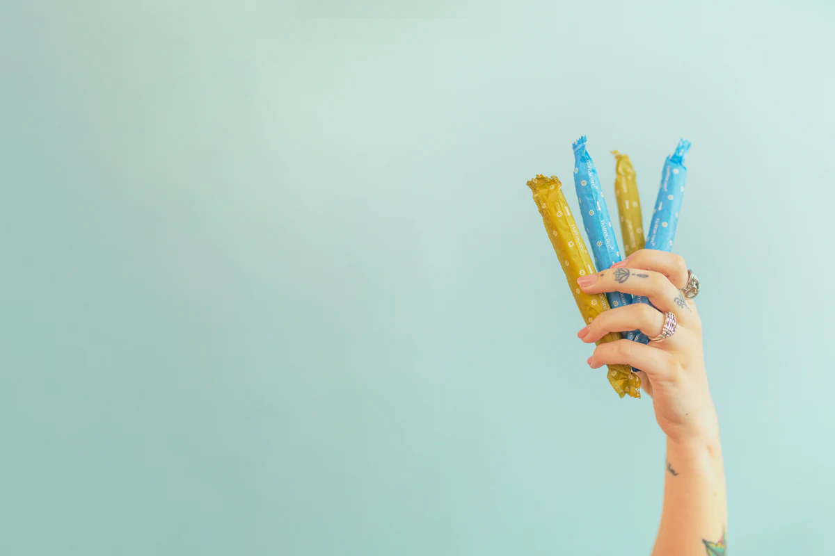hand holding natracare organic cotton tampons