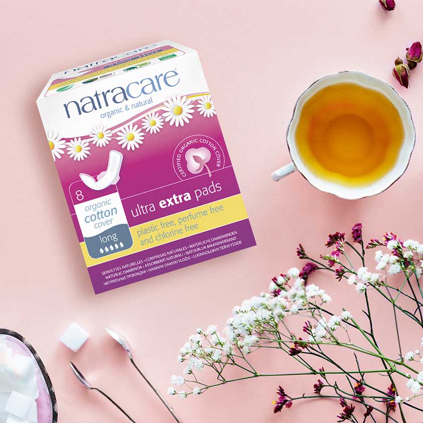 natracare ultra extra pads amongst florals and tea