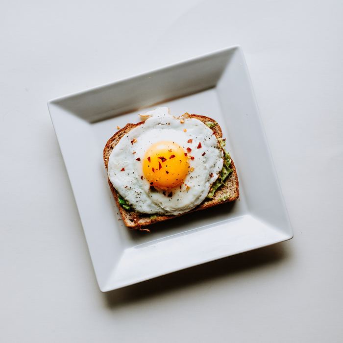 fried egg on toast with avocado