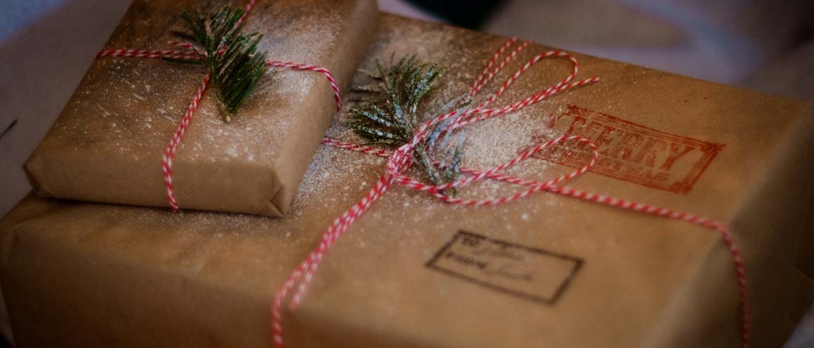 christmas presents wrapped in brown paper