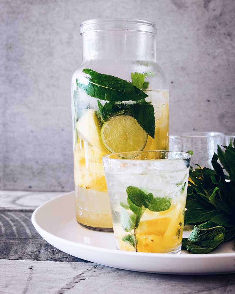 jug and glass of lemon water