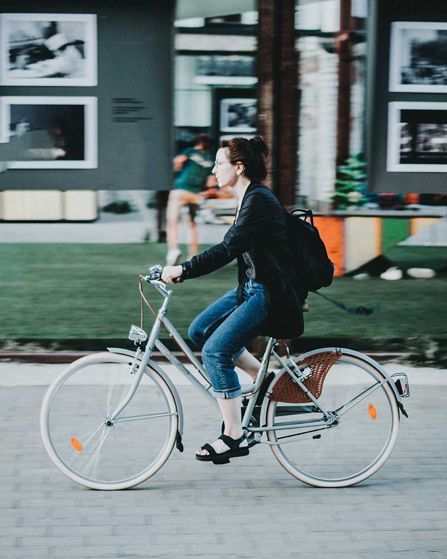 girl cycling to work