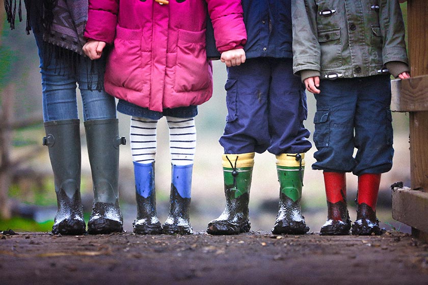 Young children holding hands