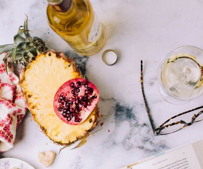 sliced pineapple with fruits