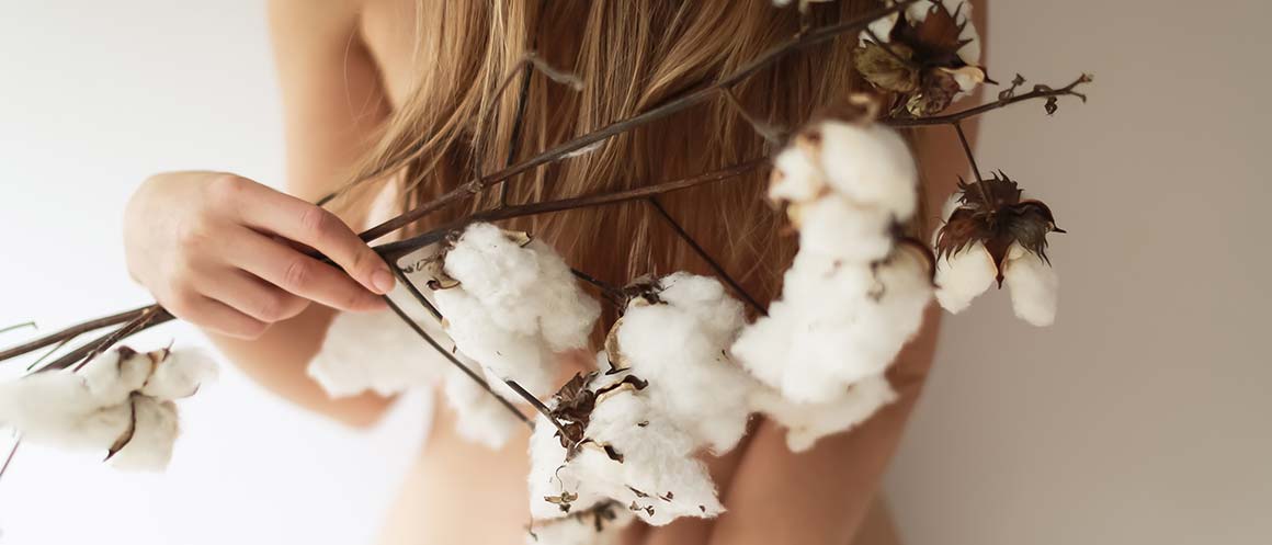 woman covering up with cotton