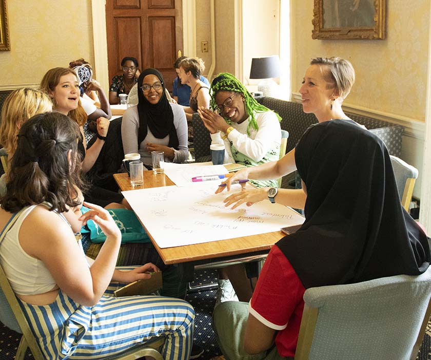 A group of women and girls at a table