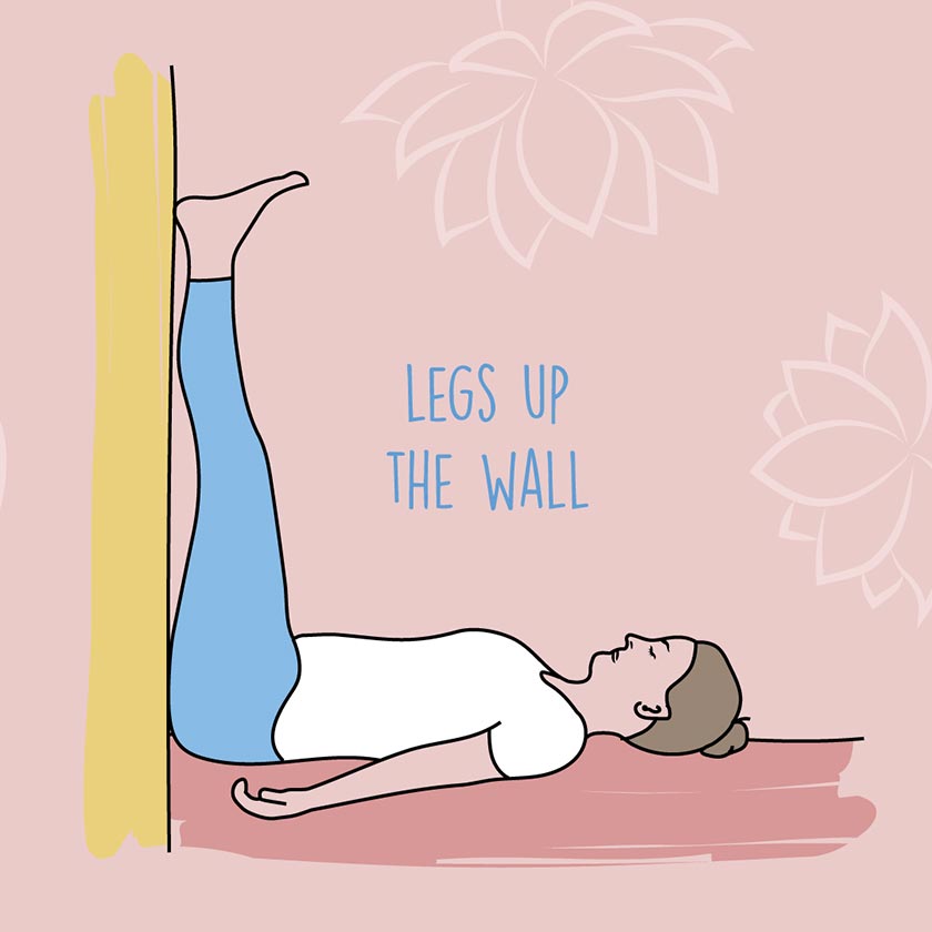 woman doing legs up the wall yoga pose