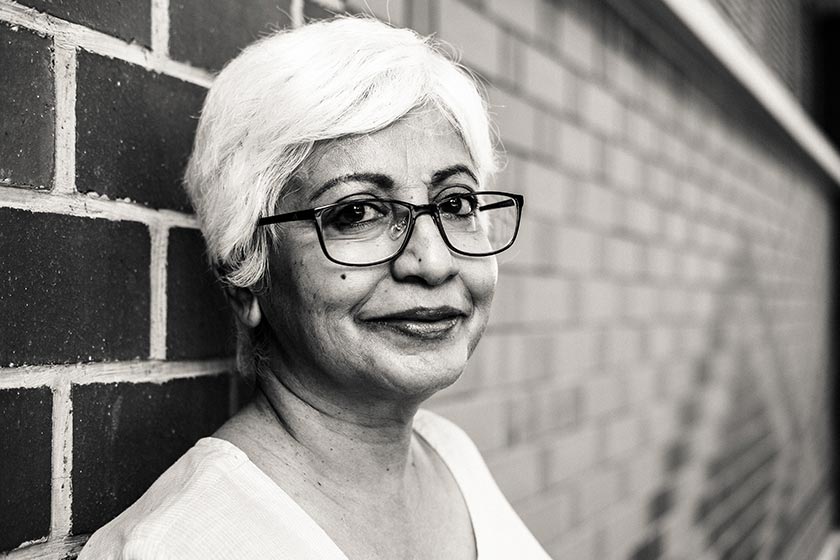 Older looking woman wearing glasses