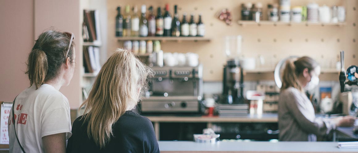 people waiting in coffee shop