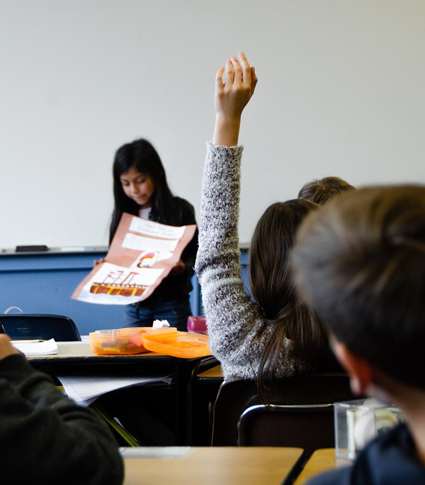 young girl giving school presentation