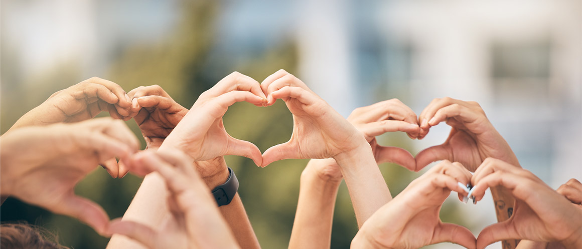 hands held in heart shapes