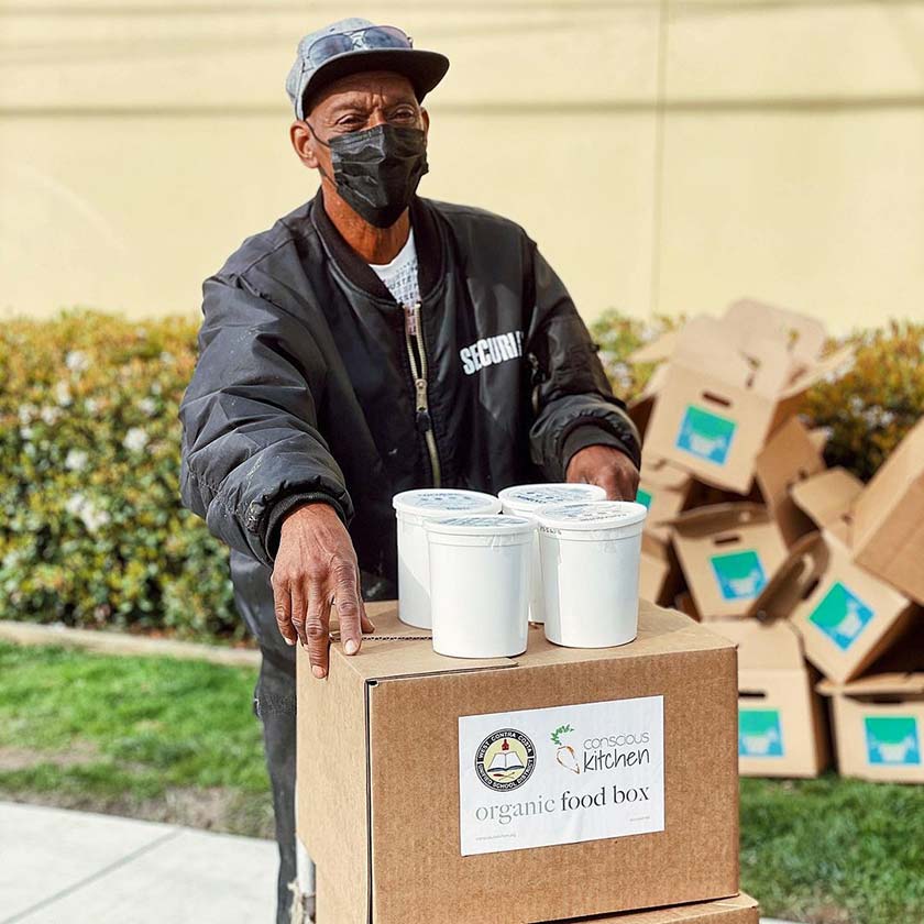 person carrying conscious kitchen food box