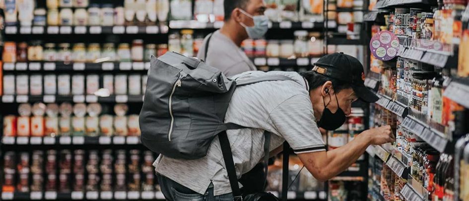 two men browsing store aisles