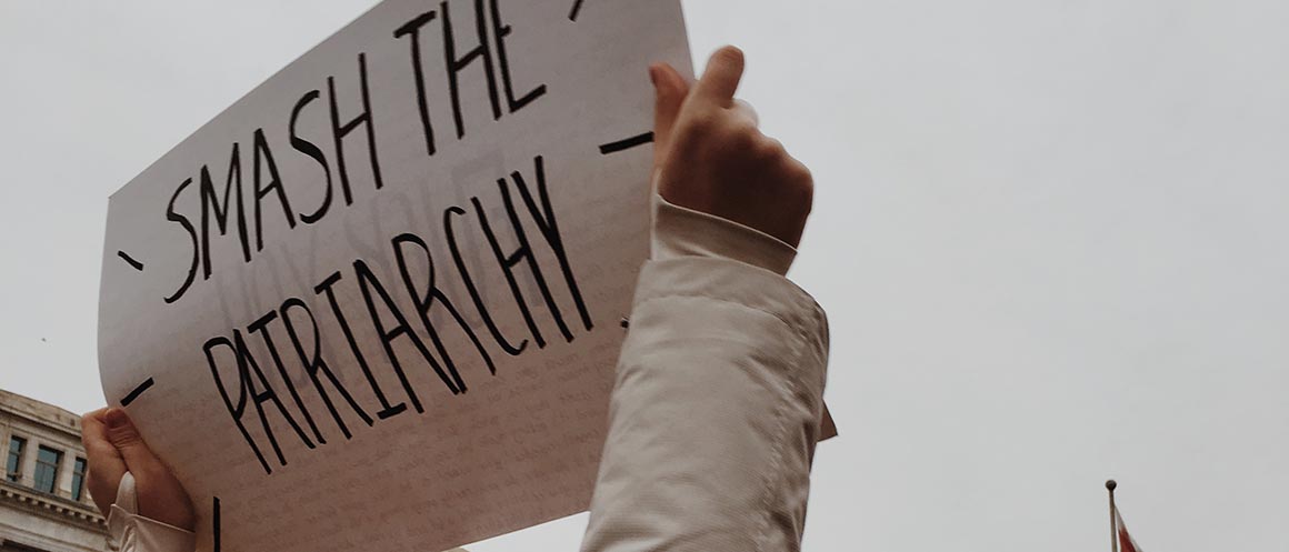smash the patriarchy protest banner