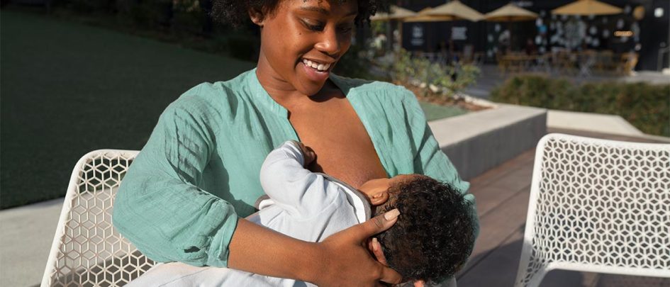 parent breastfeeding baby