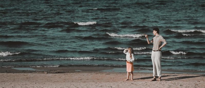 Dad and daughter on the beach